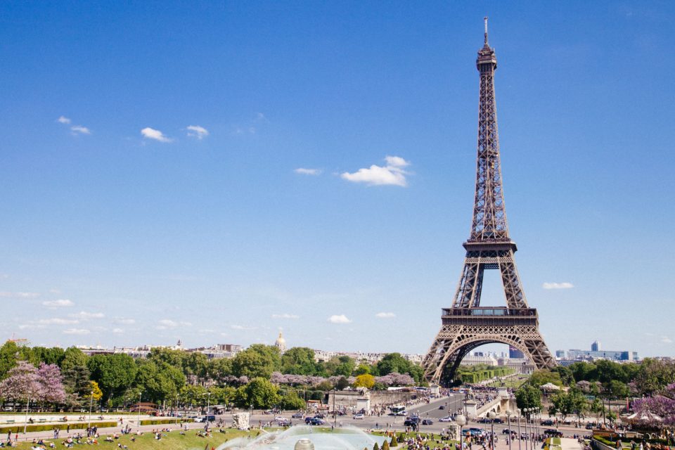 Eiffel Tower overlooking the city of Paris, France, on a sunny day