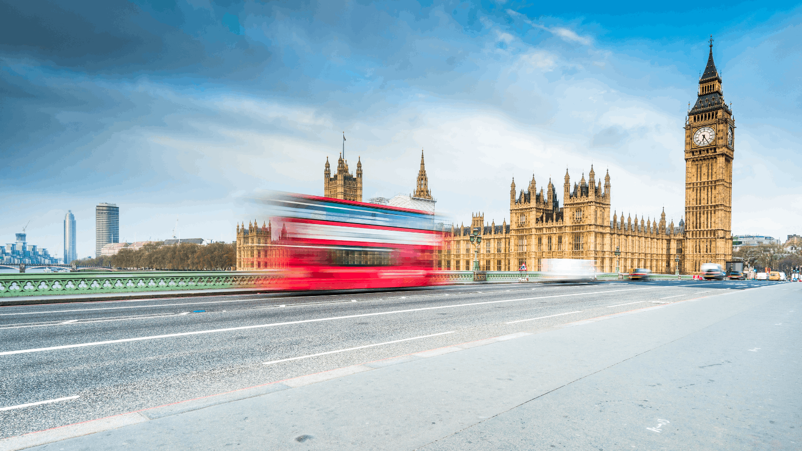 Bus in motion by Big Ben, London