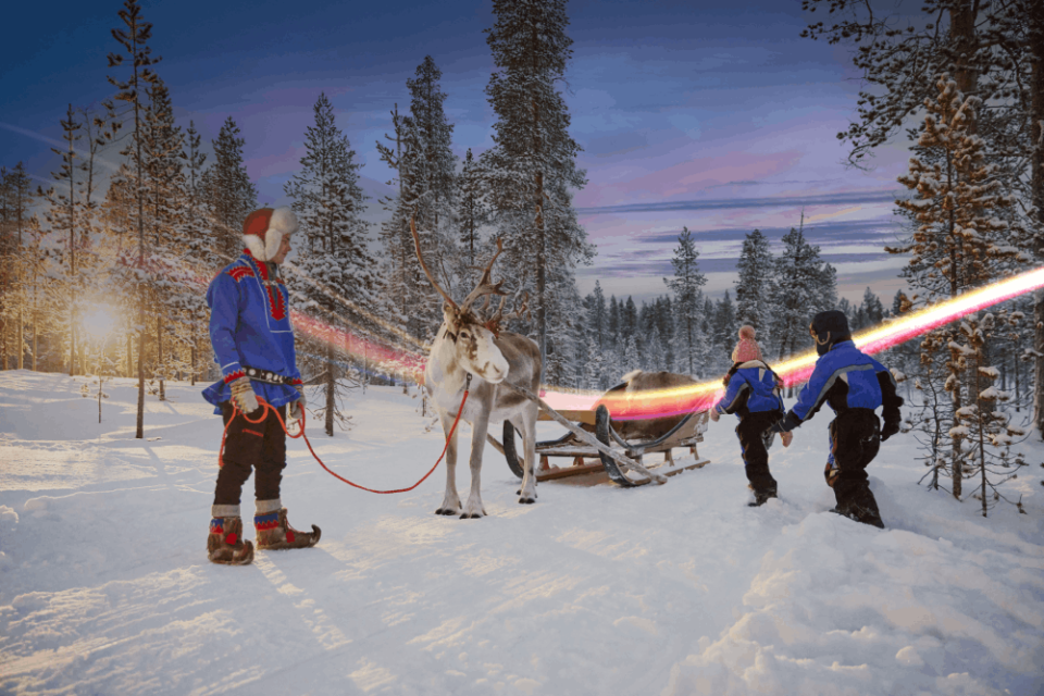 Family sleigh ride in Lapland