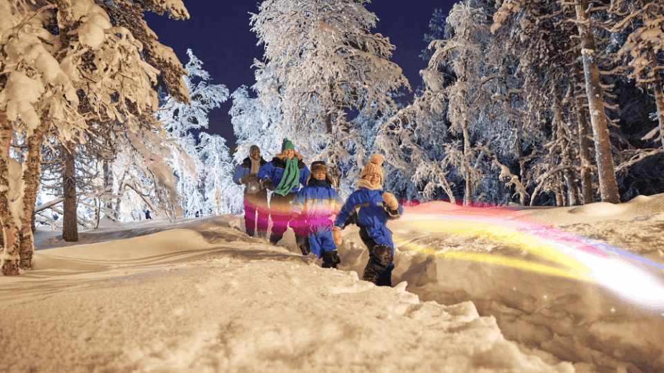 Family celebrating Christmas in lapland