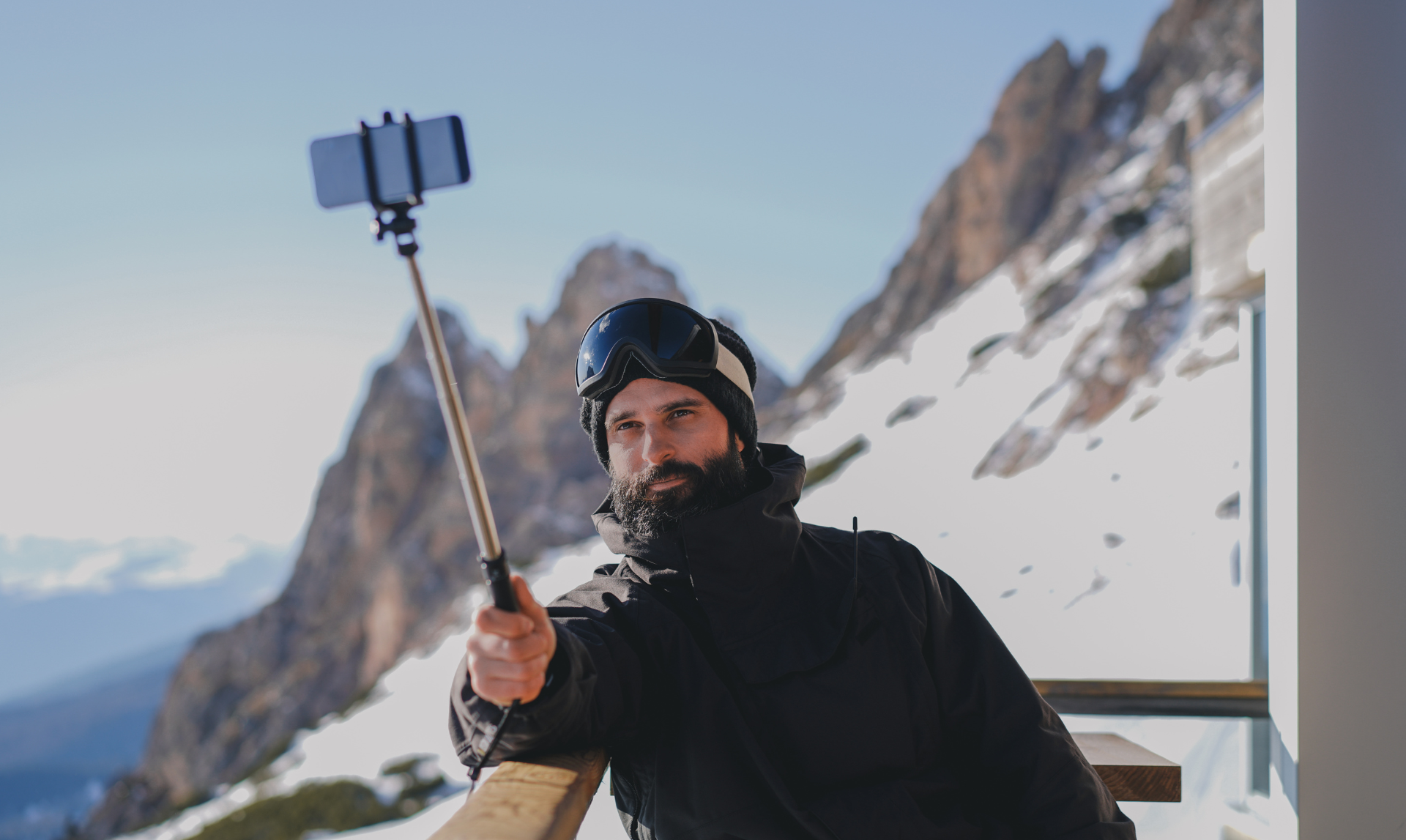 Man taking selfie on skiing holiday
