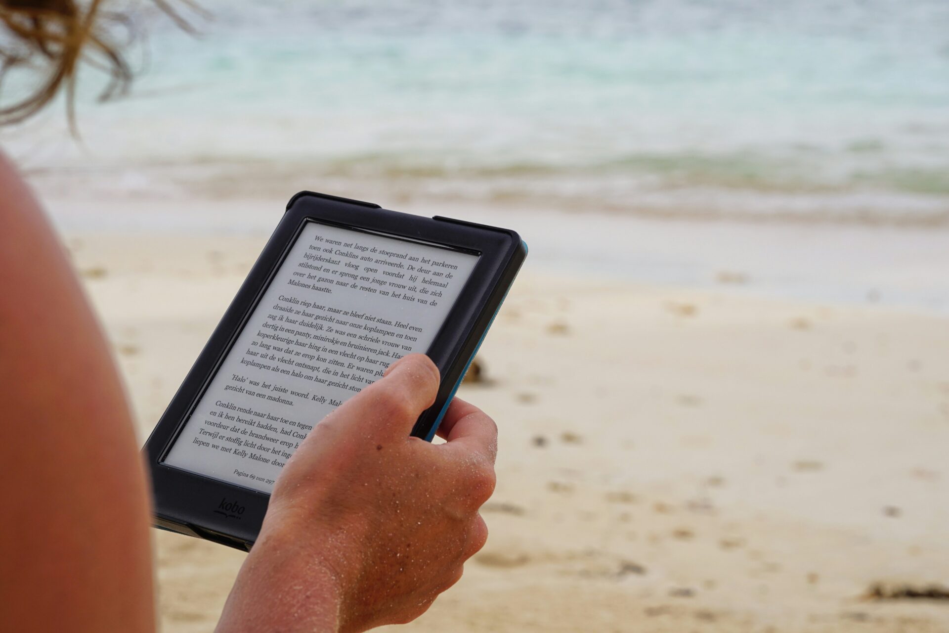 e-reader on the beach