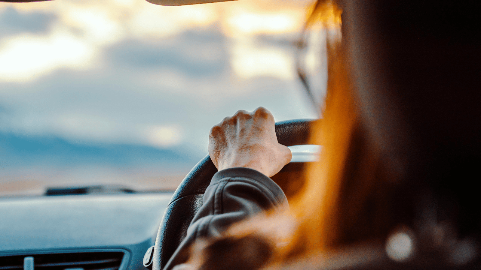 Lady driving into car park