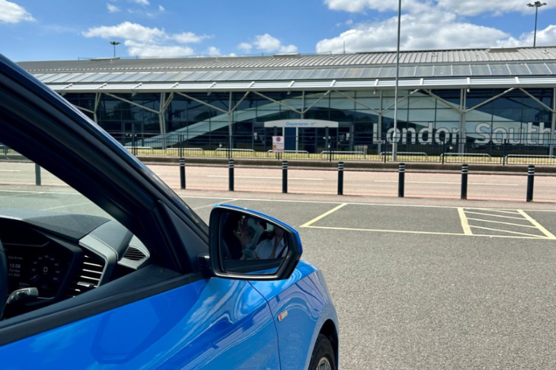 Blue car parked outside of London Southend Airport in Short Stay car park