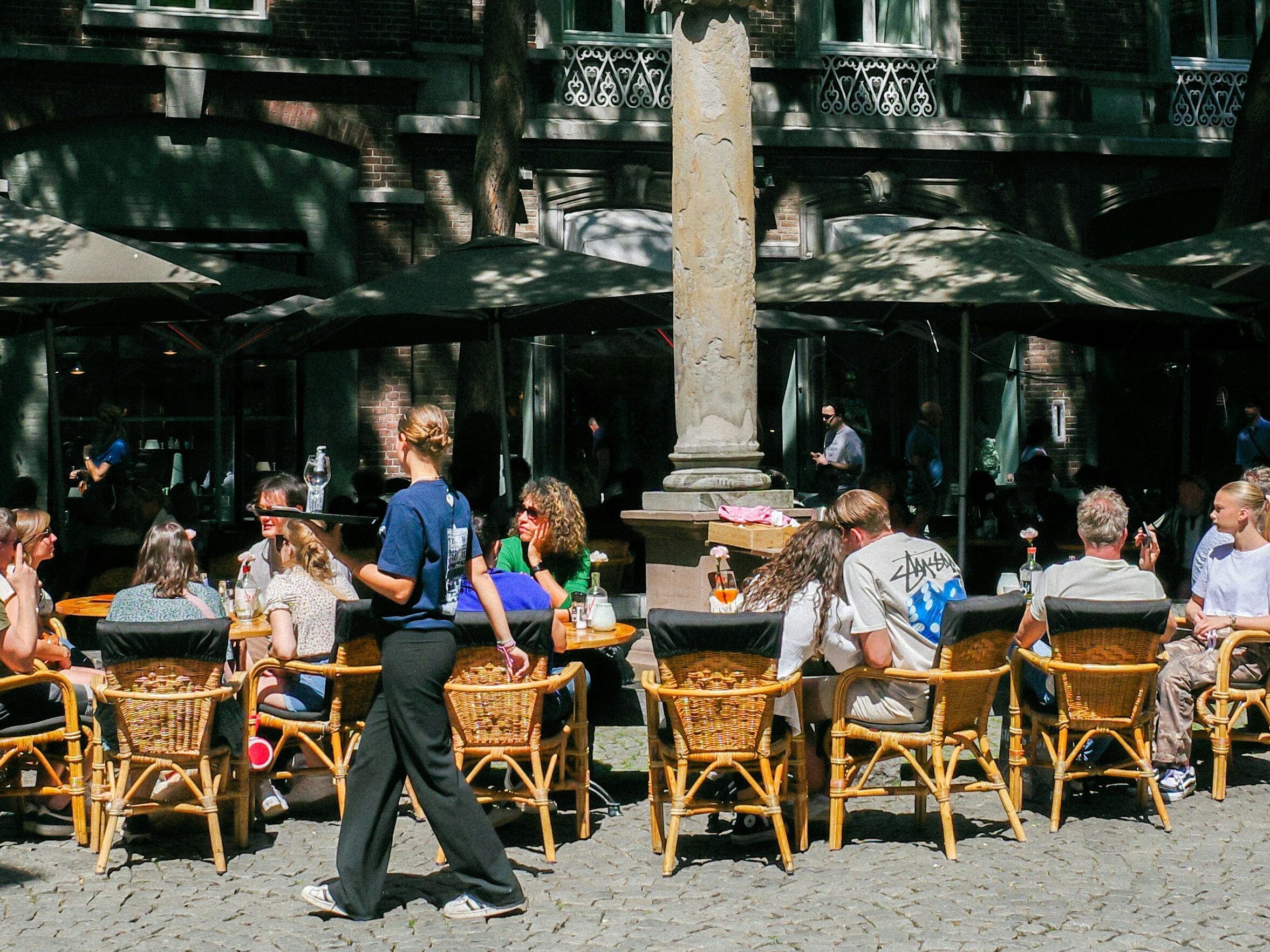 Outdoor seating at a cafe in Amsterdam.